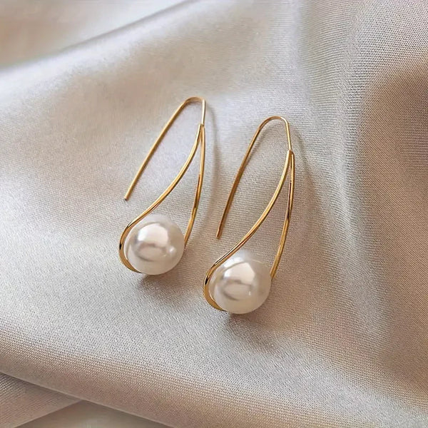 Boucles d'oreilles pendantes élégantes en perles | Or