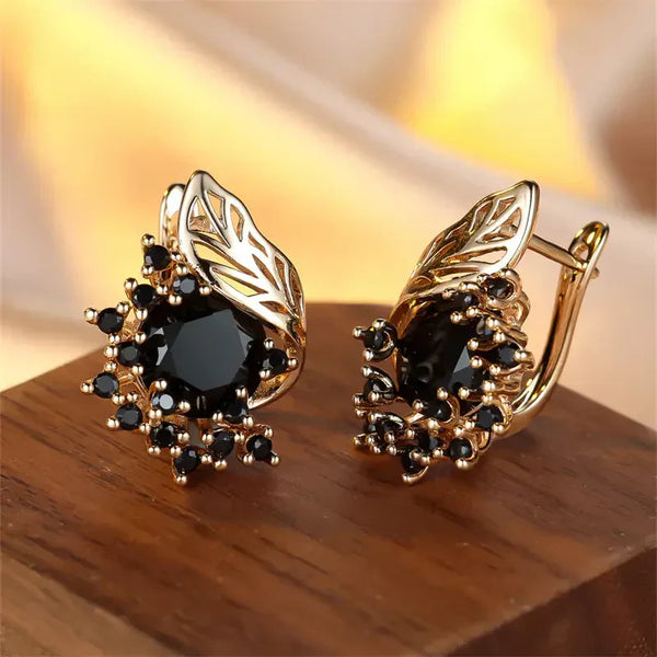 Boucles d'oreilles en zircone noire dorée | Or
