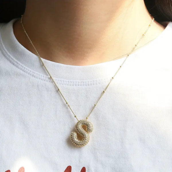Ensemble de collier avec initiale en lettres bulles | Or