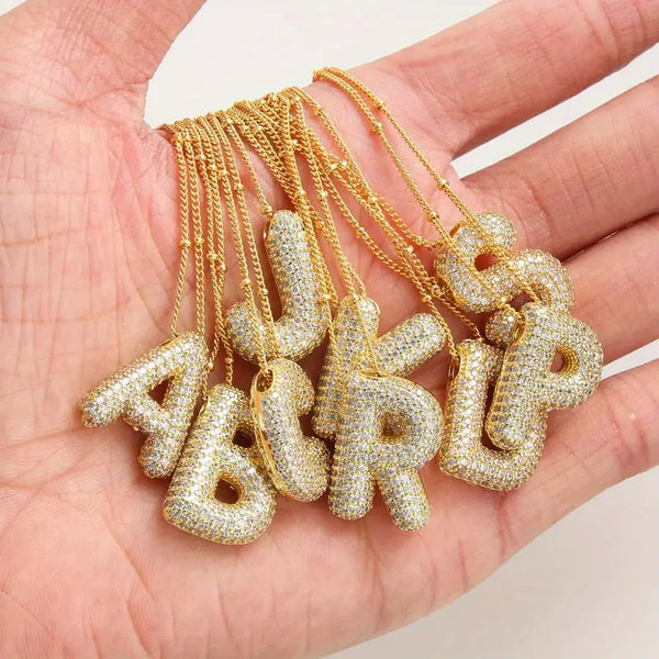 Ensemble de collier avec initiale en lettres bulles | Or