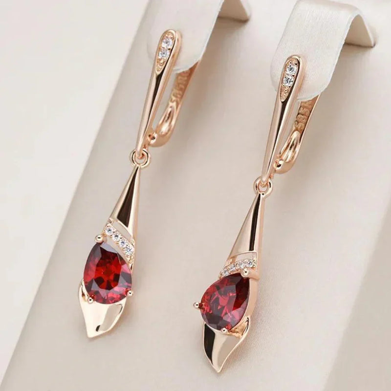 Pendentif exquis avec boucles d'oreilles en cristal rouge | Or