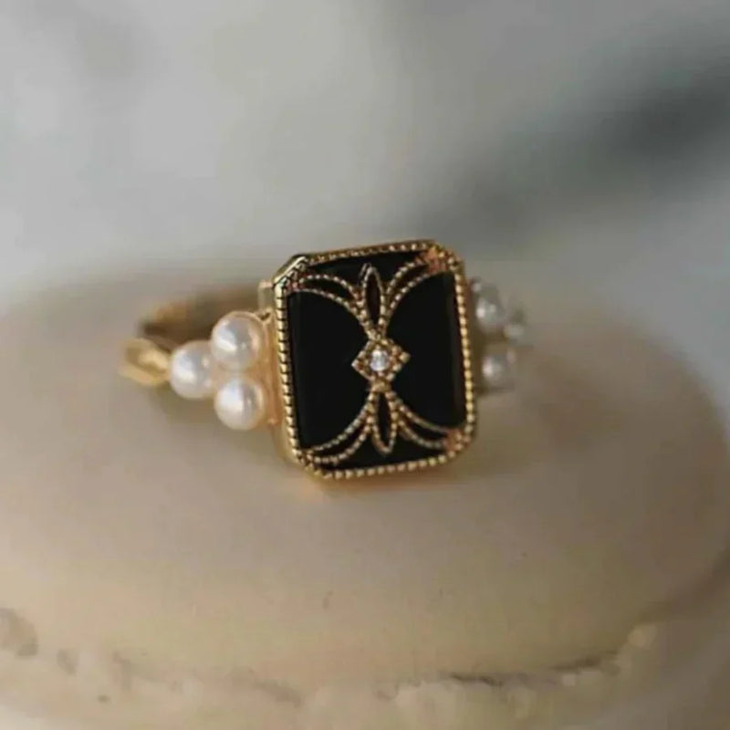 Bague antique en perle noire dorée | Or