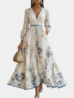 Robe longue avec manches bouffantes et col en V